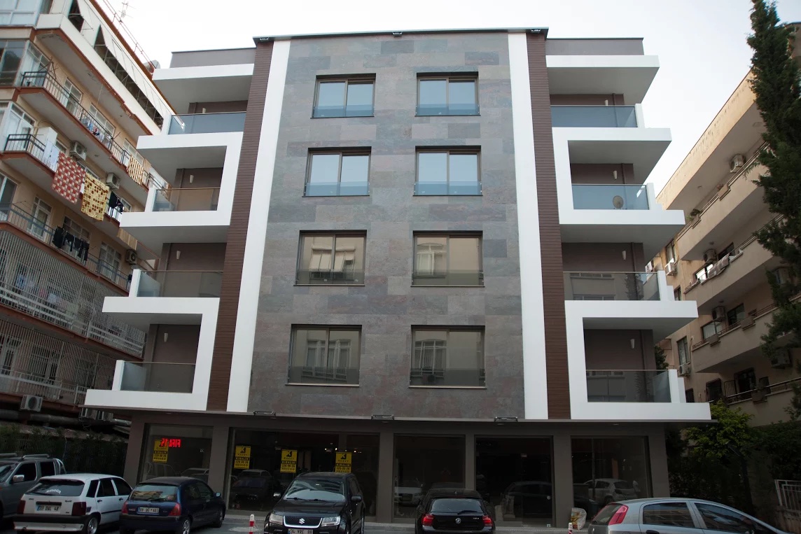 Multi color ince doğal taş bina dış cephe uygulaması